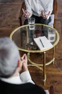 People at table having tough conversation